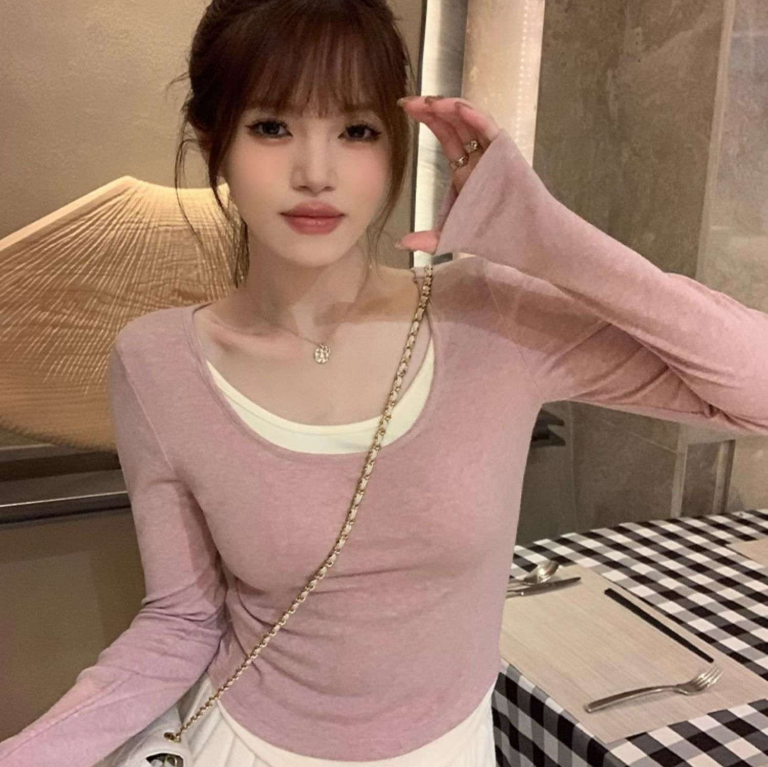 ピンクコーデ レイヤード風長袖ニットトップス